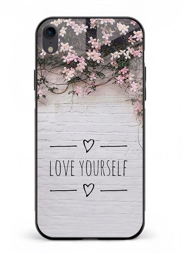 Floral self-love message printed on iphone xr glass back cover with gentle pastel tones.