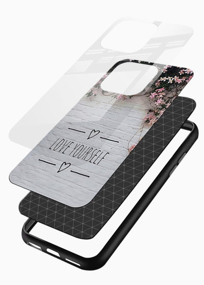 Floral self-love message printed on glossy vibrant premium glass back cover with gentle pastel tones. - Angle Layers