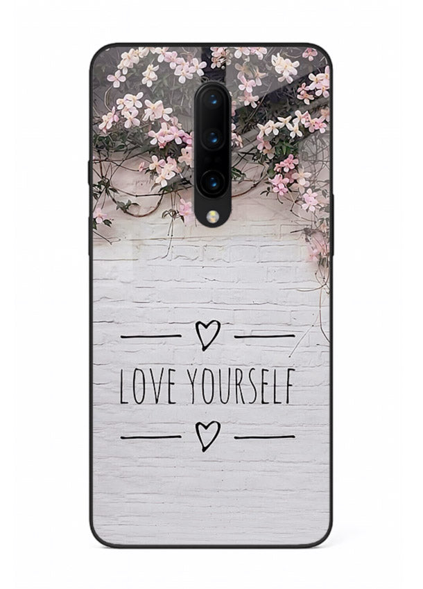 Floral self-love message printed on OnePlus 7T Pro glass back cover with gentle pastel tones.