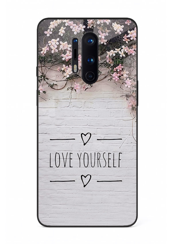 Floral self-love message printed on OnePlus 8 Pro glass back cover with gentle pastel tones.