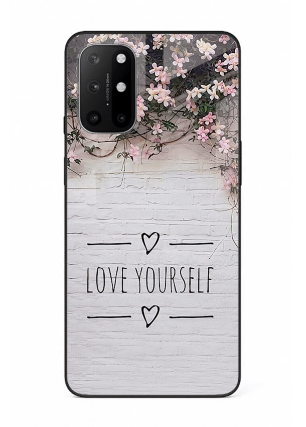 Floral self-love message printed on OnePlus 8T glass back cover with gentle pastel tones.