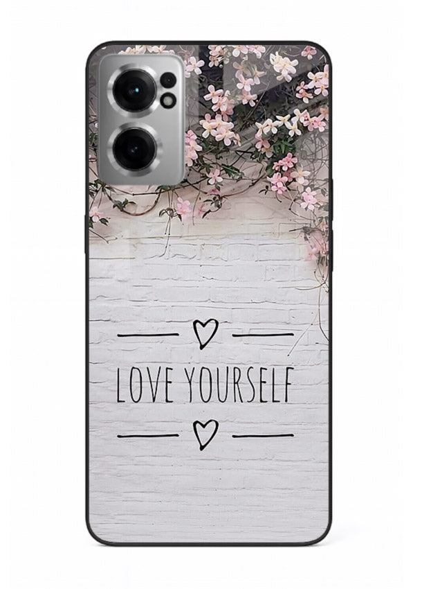 Floral self-love message printed on OnePlus Nord CE2 5G glass back cover with gentle pastel tones.