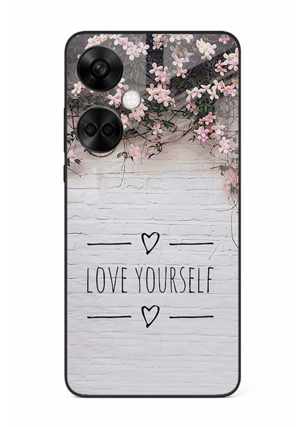 Floral self-love message printed on OnePlus Nord CE3 glass back cover with gentle pastel tones.