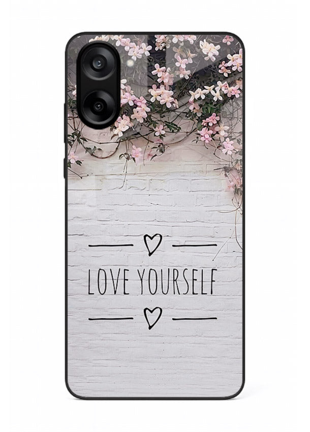 Floral self-love message printed on OnePlus Nord CE5 glass back cover with gentle pastel tones.