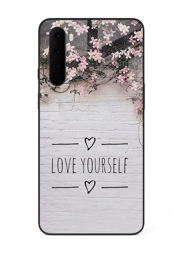 Floral self-love message printed on OnePlus Nord glass back cover with gentle pastel tones.
