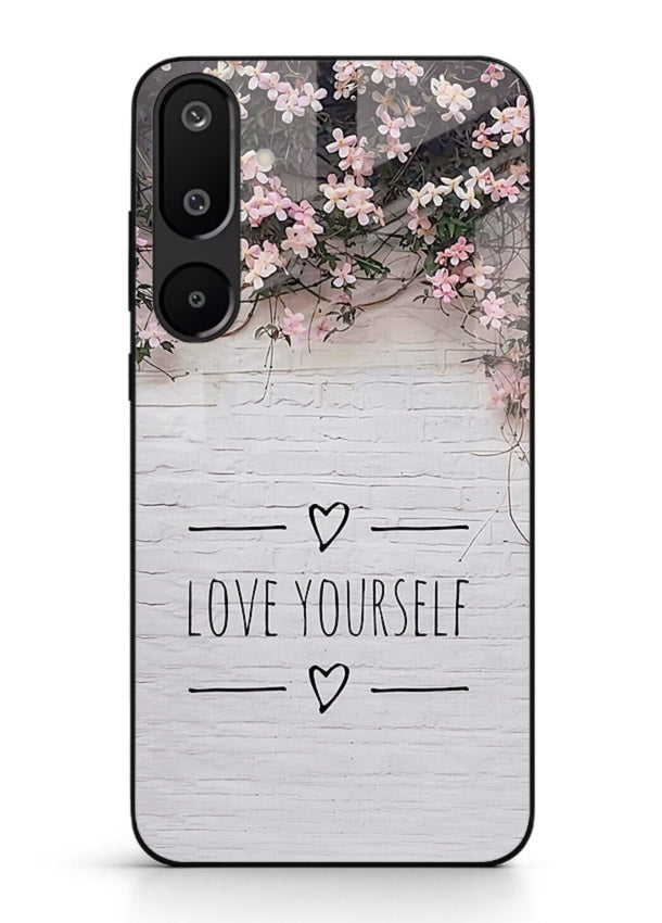 Floral self-love message printed on Samsung F16 5G glass back cover with gentle pastel tones.