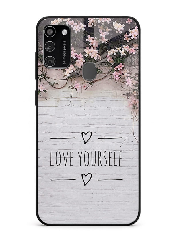 Floral self-love message printed on Samsung M21 glass back cover with gentle pastel tones.