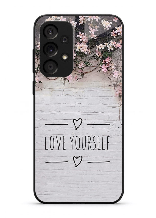 Floral self-love message printed on Samsung A73 5G glass back cover with gentle pastel tones.