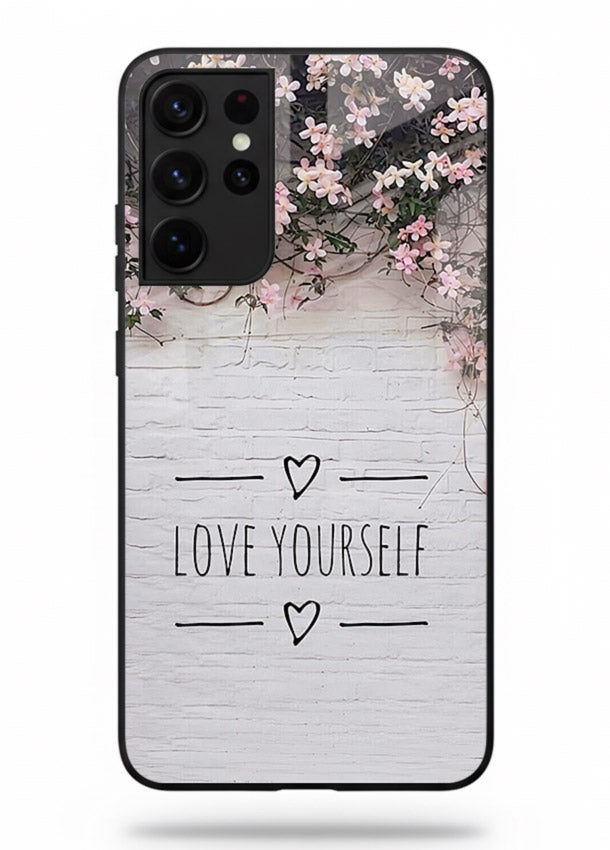 Floral self-love message printed on Samsung S21 Ultra glass back cover with gentle pastel tones.