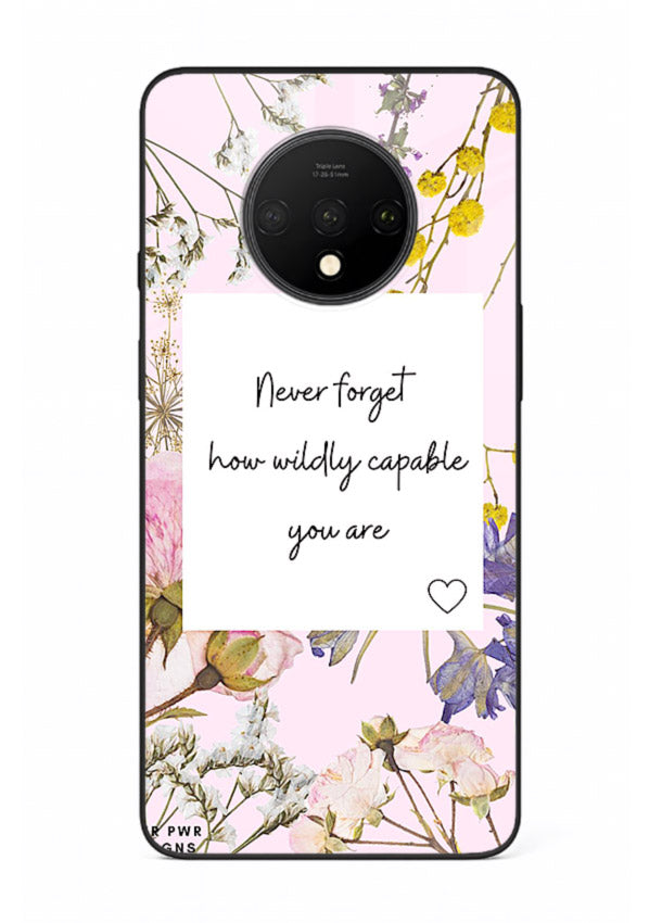 Floral-bordered motivational message printed on OnePlus 7T glass back cover with soft tones.