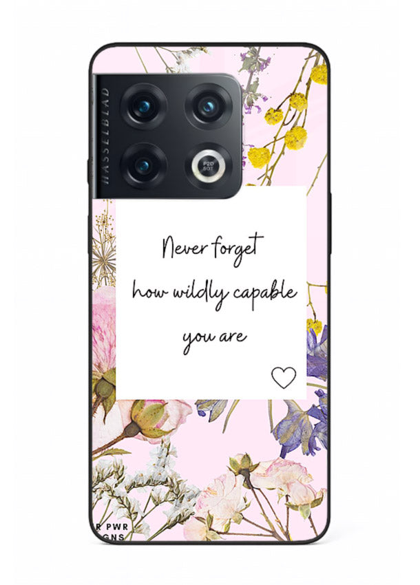 Floral-bordered motivational message printed on OnePlus 10 Pro glass back cover with soft tones.