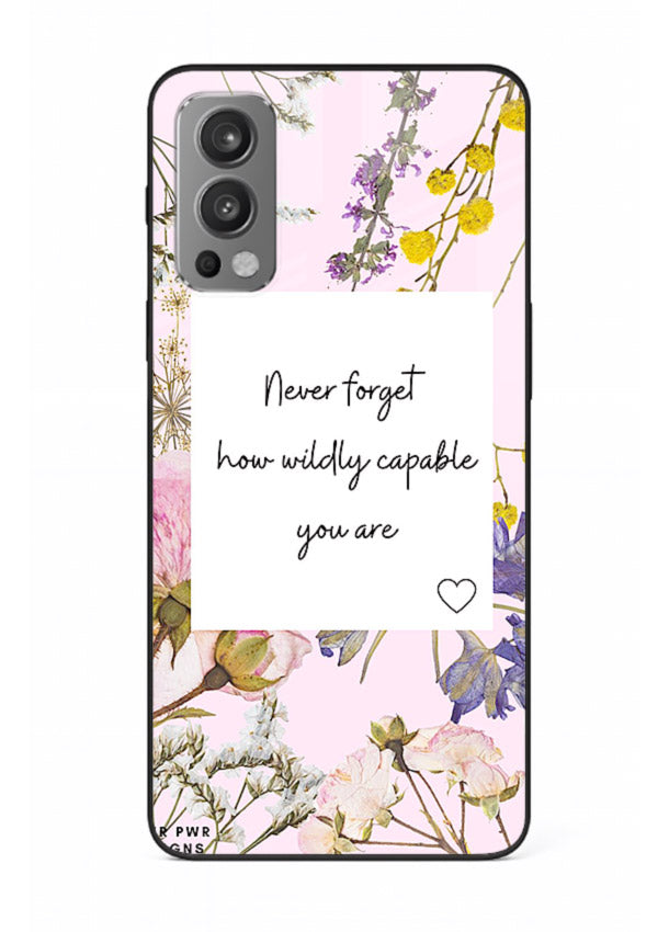 Floral-bordered motivational message printed on OnePlus Nord 2 glass back cover with soft tones.