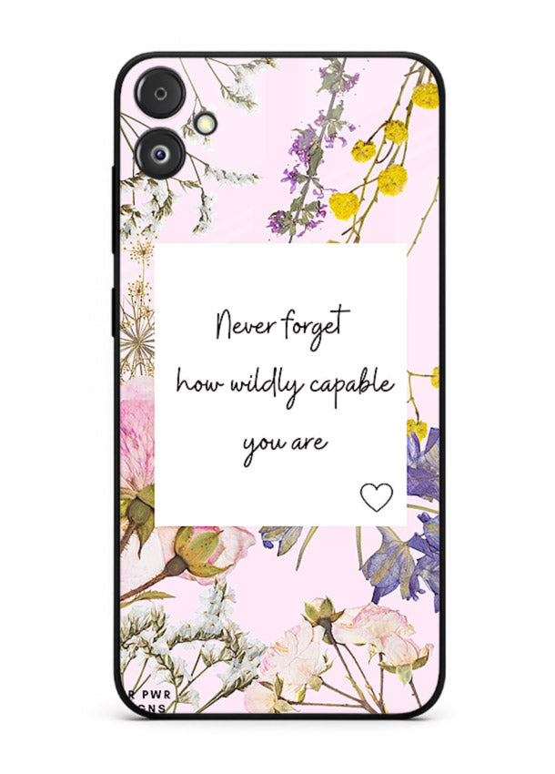 Floral-bordered motivational message printed on Samsung F14 5G glass back cover with soft tones.
