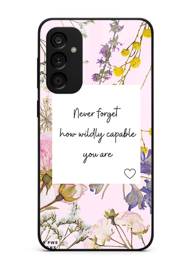 Floral-bordered motivational message printed on Samsung A04s 5G glass back cover with soft tones.