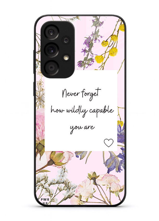 Floral-bordered motivational message printed on Samsung A73 5G glass back cover with soft tones.