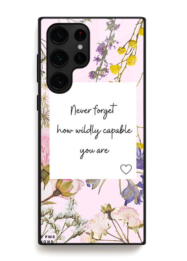 Floral-bordered motivational message printed on Samsung S22 Ultra glass back cover with soft tones.