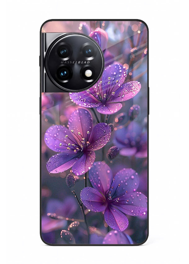 Purple dew petal artwork on OnePlus 11 glass back cover with soft glowing tones.