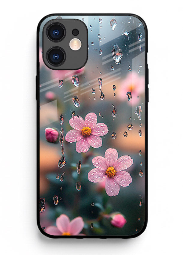 Raindrop cherry blossom artwork on iphone 12 glass back cover with soft pastel tones.