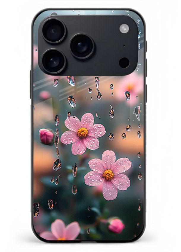 Raindrop cherry blossom artwork on iphone 17 pro max glass back cover with soft pastel tones.