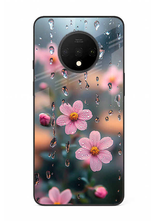 Raindrop cherry blossom artwork on OnePlus 7T glass back cover with soft pastel tones.