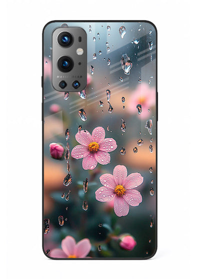 Raindrop cherry blossom artwork on OnePlus 9 glass back cover with soft pastel tones.