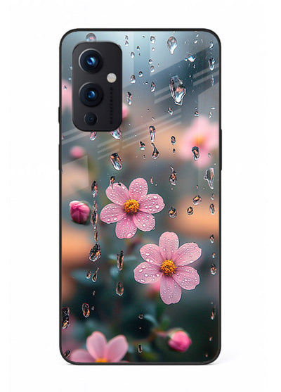 Raindrop cherry blossom artwork on OnePlus 9 Pro glass back cover with soft pastel tones.