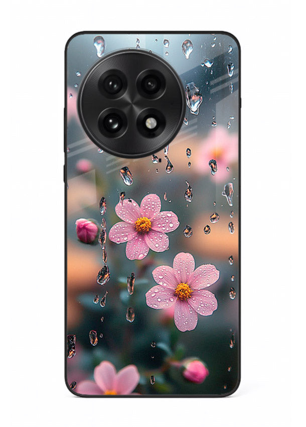 Raindrop cherry blossom artwork on OnePlus 13 glass back cover with soft pastel tones.