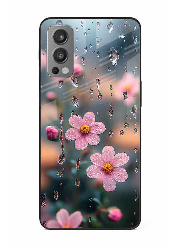 Raindrop cherry blossom artwork on OnePlus Nord 2 glass back cover with soft pastel tones.