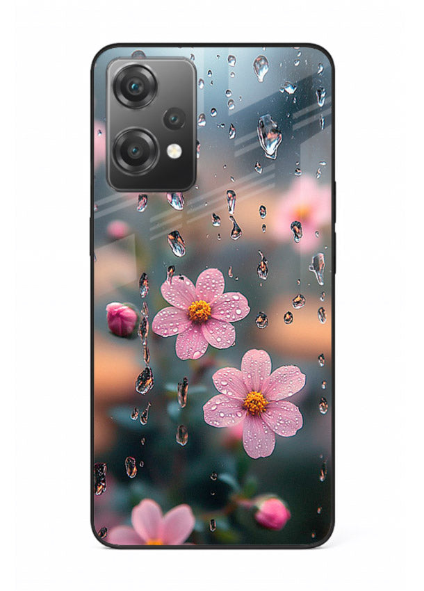 Raindrop cherry blossom artwork on OnePlus Nord CE2 Lite 5G glass back cover with soft pastel tones.