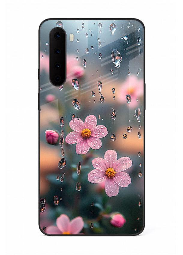 Raindrop cherry blossom artwork on OnePlus Nord glass back cover with soft pastel tones.
