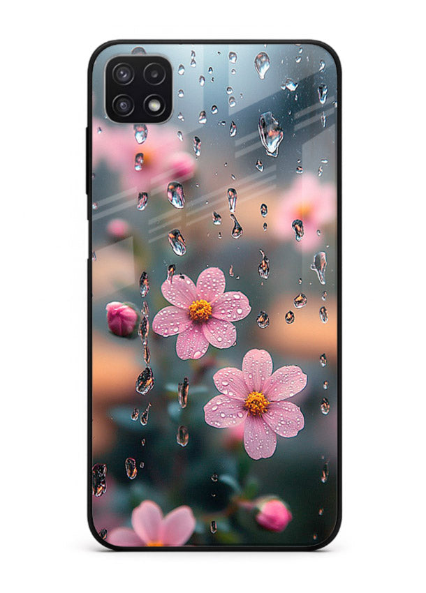 Raindrop cherry blossom artwork on Samsung F42 5G glass back cover with soft pastel tones.