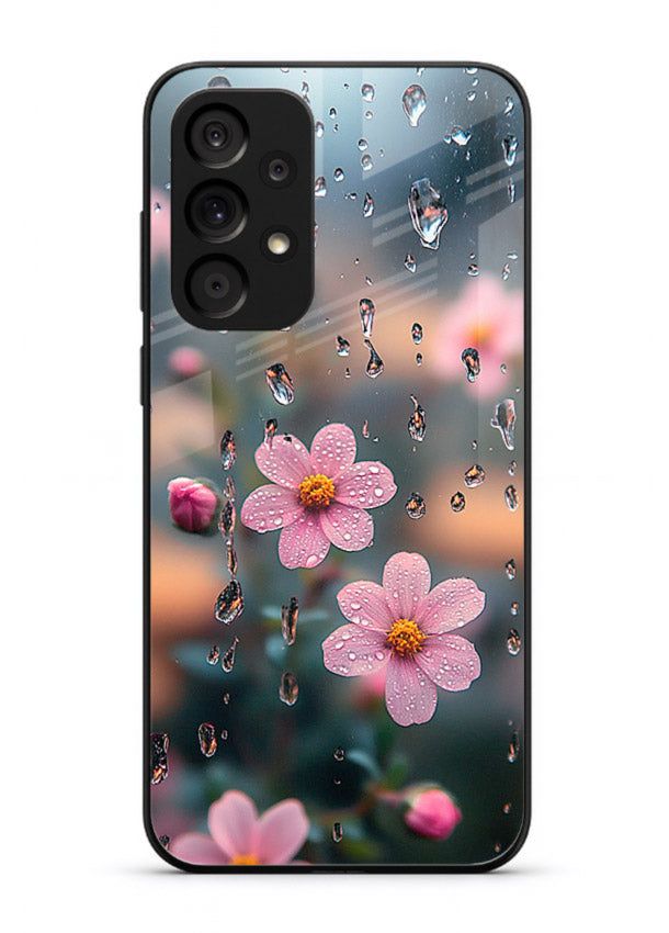 Raindrop cherry blossom artwork on Samsung A73 5G glass back cover with soft pastel tones.