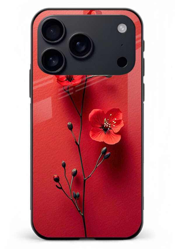 Minimal red bloom artwork on iphone 17 pro max glass back cover with warm soft tones.