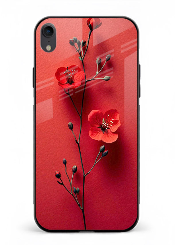 Minimal red bloom artwork on iphone xr glass back cover with warm soft tones.