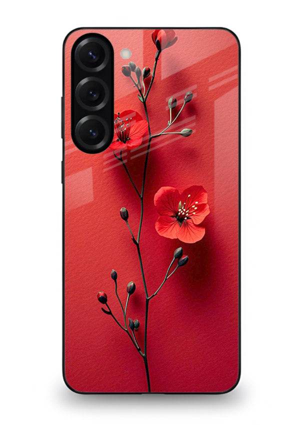Minimal red bloom artwork on Samsung S23 Plus glass back cover with warm soft tones.