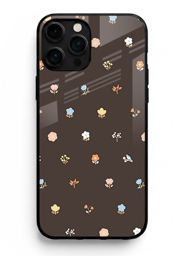 Pastel tiny flower pattern on iphone 16 pro max glass back cover with playful botanical spacing.