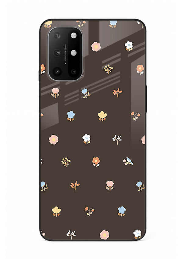 Pastel tiny flower pattern on OnePlus 8T glass back cover with playful botanical spacing.