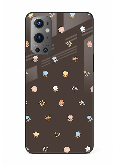 Pastel tiny flower pattern on OnePlus 9 glass back cover with playful botanical spacing.