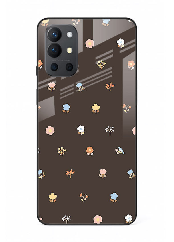 Pastel tiny flower pattern on OnePlus 9R glass back cover with playful botanical spacing.
