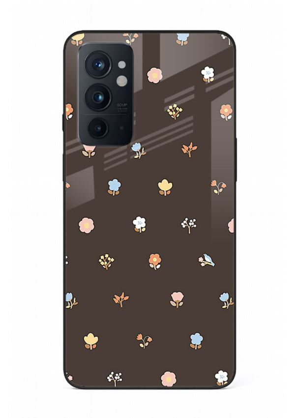 Pastel tiny flower pattern on OnePlus 9RT glass back cover with playful botanical spacing.