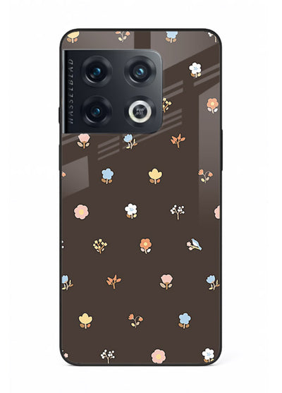 Pastel tiny flower pattern on OnePlus 10 Pro glass back cover with playful botanical spacing.