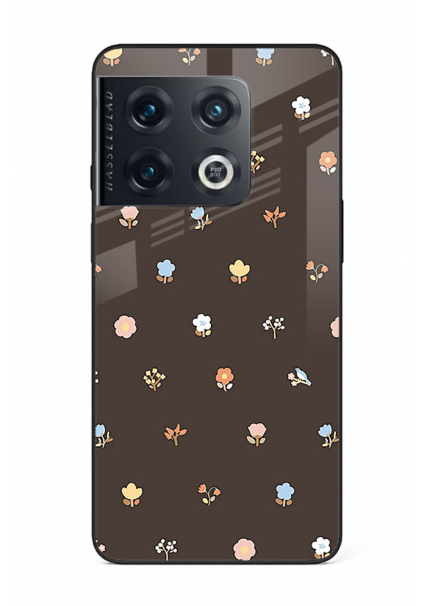 Pastel tiny flower pattern on OnePlus 10 Pro glass back cover with playful botanical spacing.