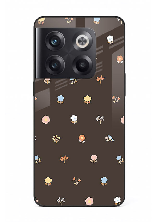 Pastel tiny flower pattern on OnePlus 10T glass back cover with playful botanical spacing.