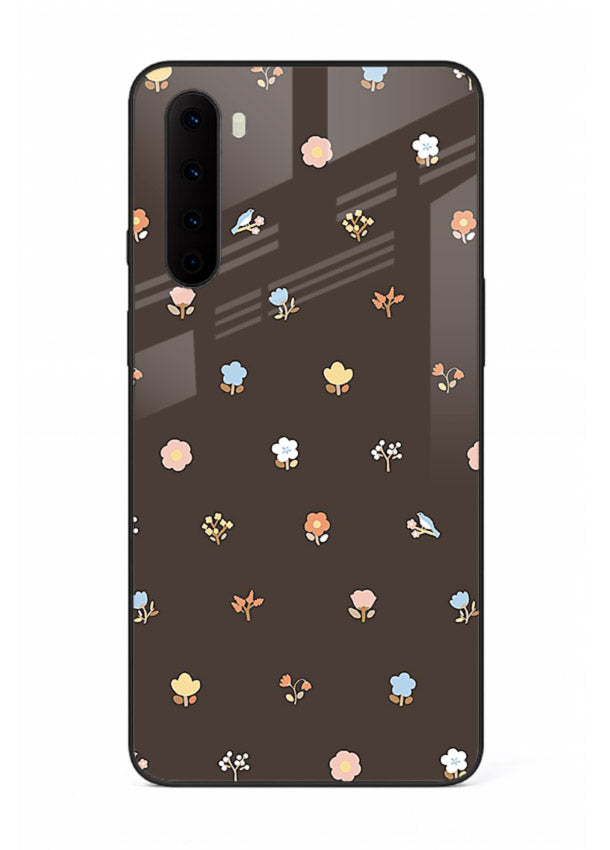 Pastel tiny flower pattern on OnePlus Nord glass back cover with playful botanical spacing.
