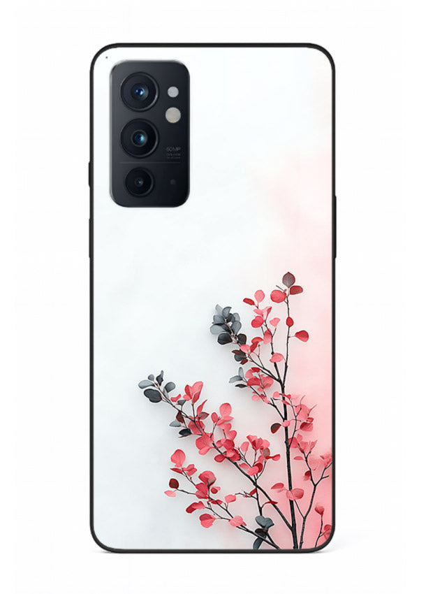Red leaf artwork on OnePlus 9RT glass back cover with warm drifting botanical tones.