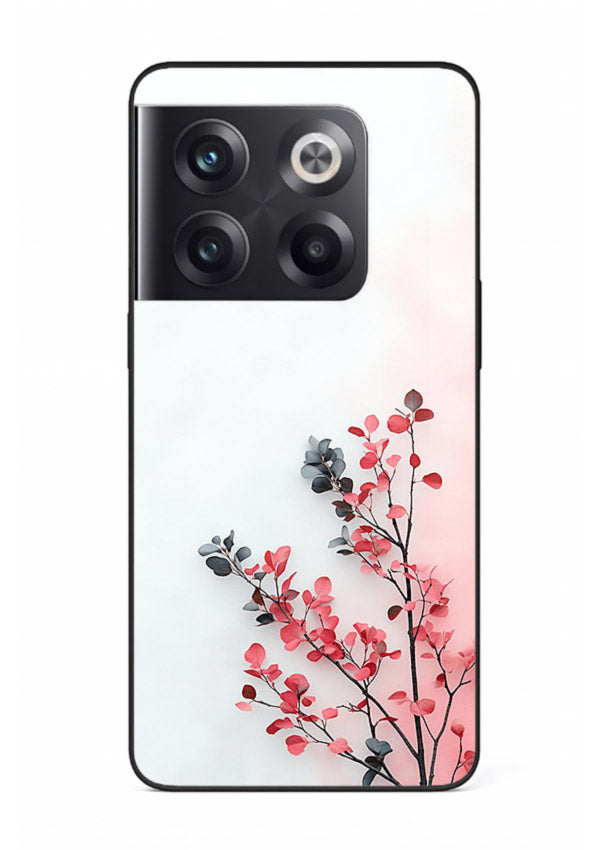 Red leaf artwork on OnePlus 10T glass back cover with warm drifting botanical tones.
