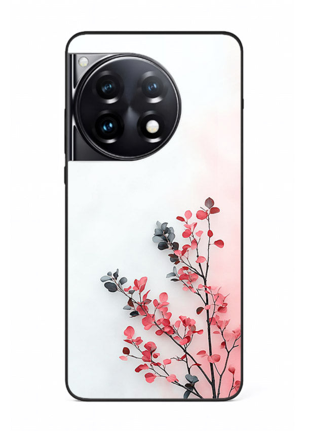 Red leaf artwork on OnePlus 12R glass back cover with warm drifting botanical tones.