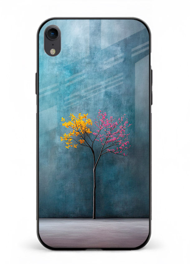 Blue tree artwork on iphone xr glass back cover with soft minimal artistic tones.