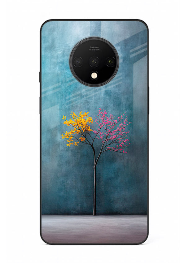Blue tree artwork on OnePlus 7T glass back cover with soft minimal artistic tones.