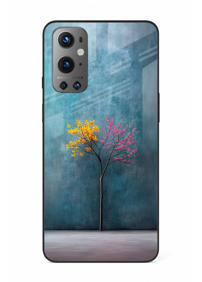 Blue tree artwork on OnePlus 9 glass back cover with soft minimal artistic tones.